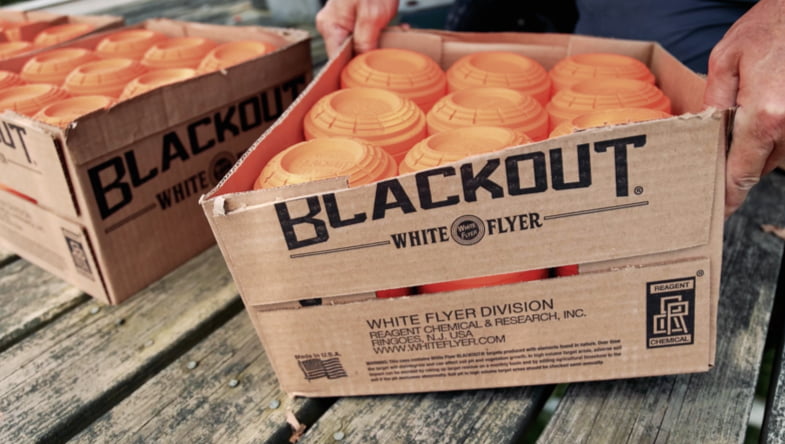 Open box of White Flyer Blackout targets to show them stacked inside