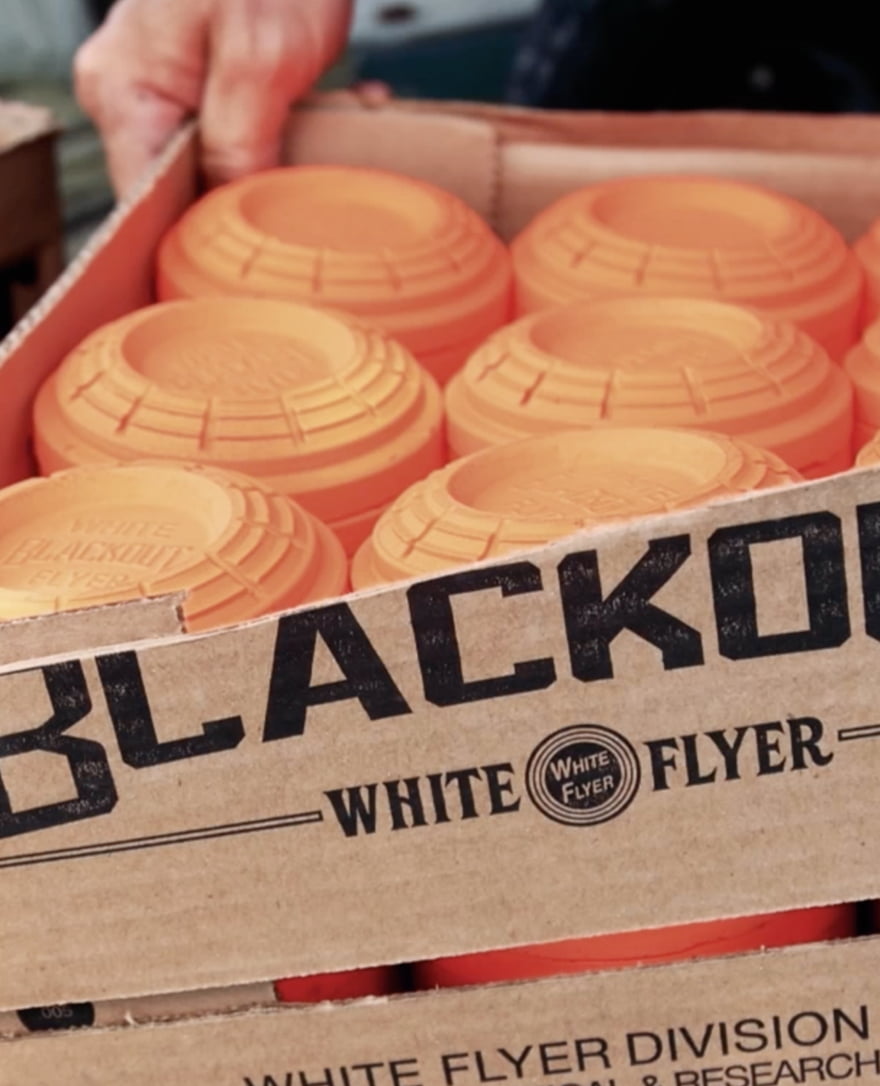 Open box of White Flyer Blackout targets to show them stacked inside