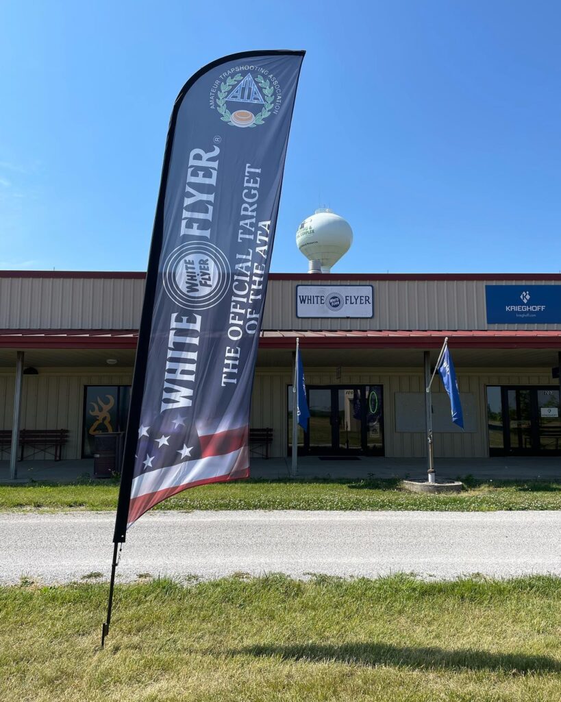 White Flyer outdoor vertical flag banner at shooting event