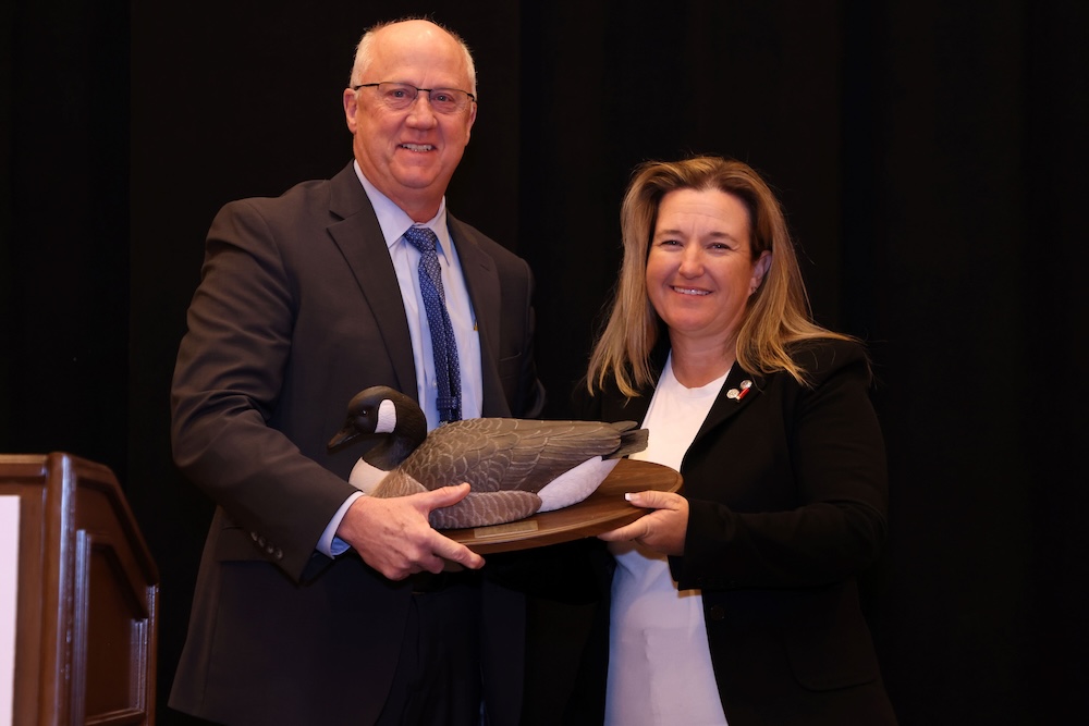 Kim Rhode receiving the NSSF Ken Sedlecky Lifetime Achievement Award